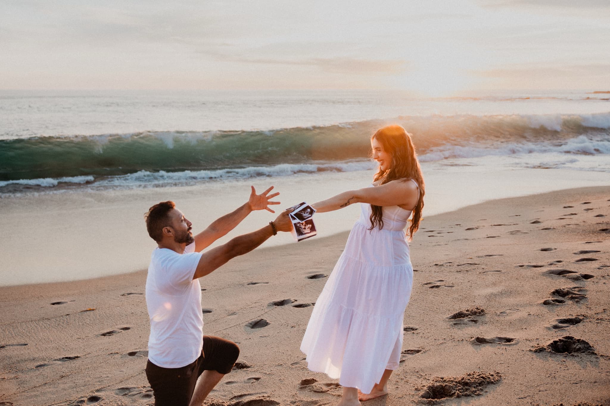 His reaction after the announcement — beach at sunset