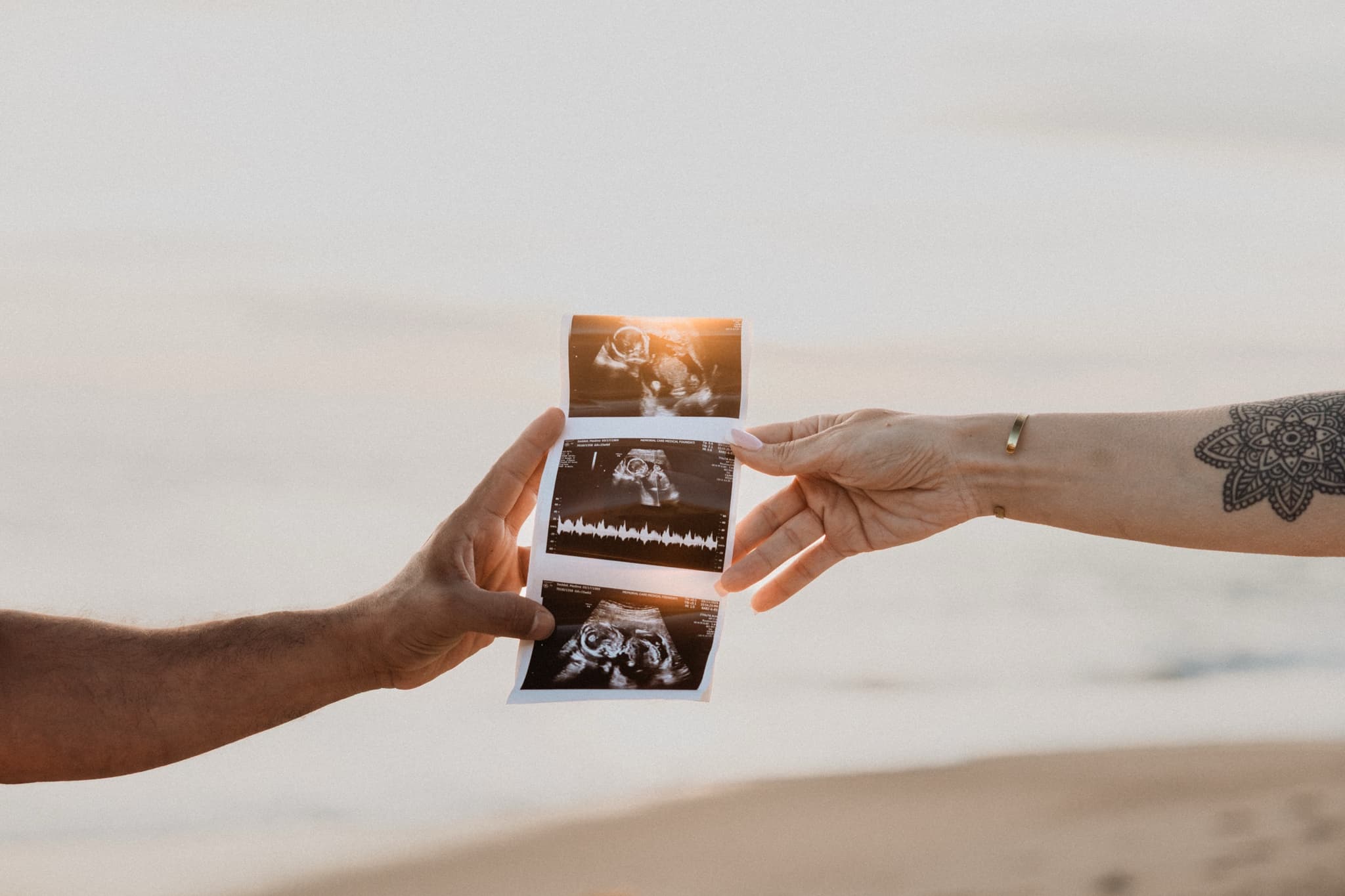 Passing the sonogram between them at golden hour