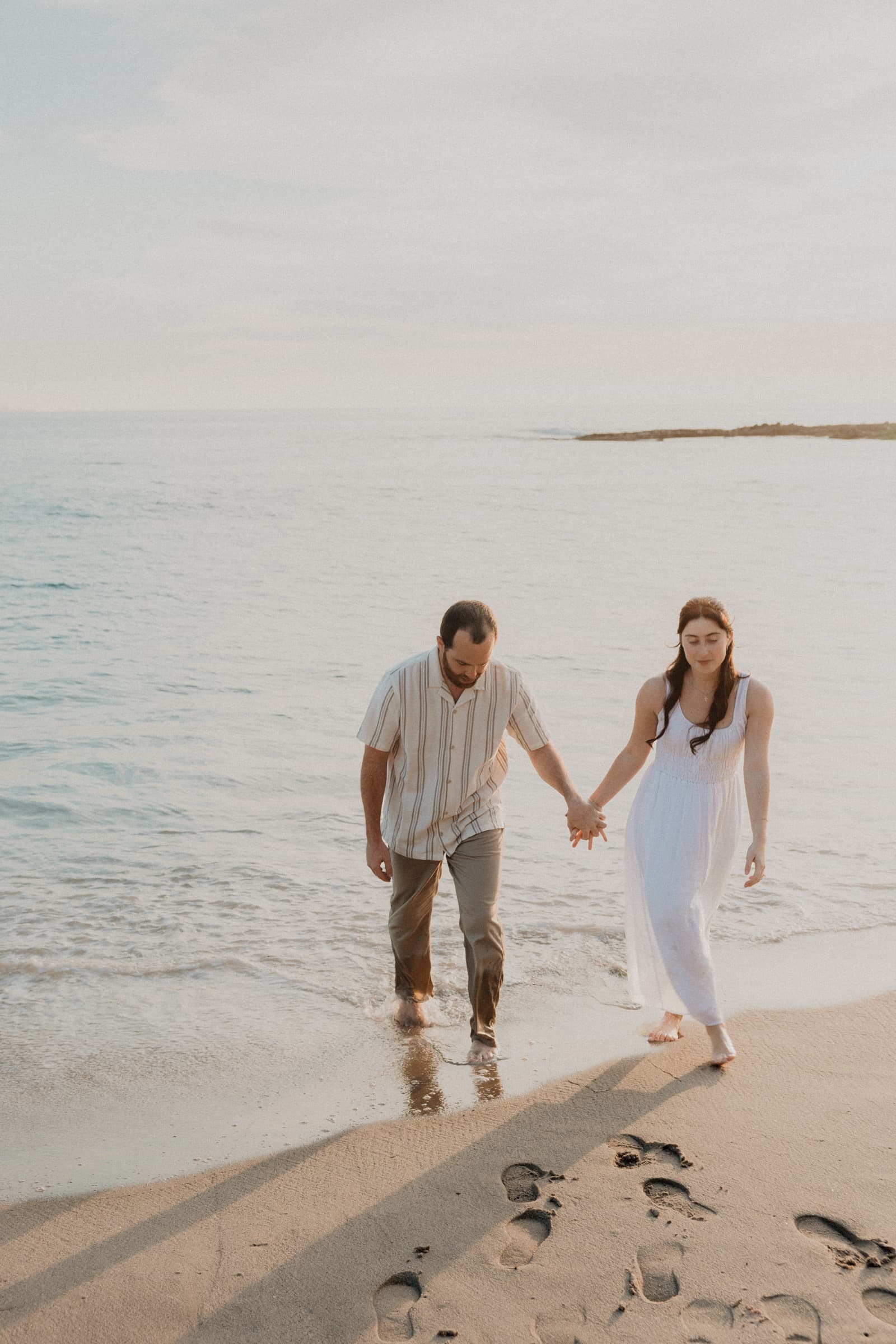 Couple at golden hour — beach