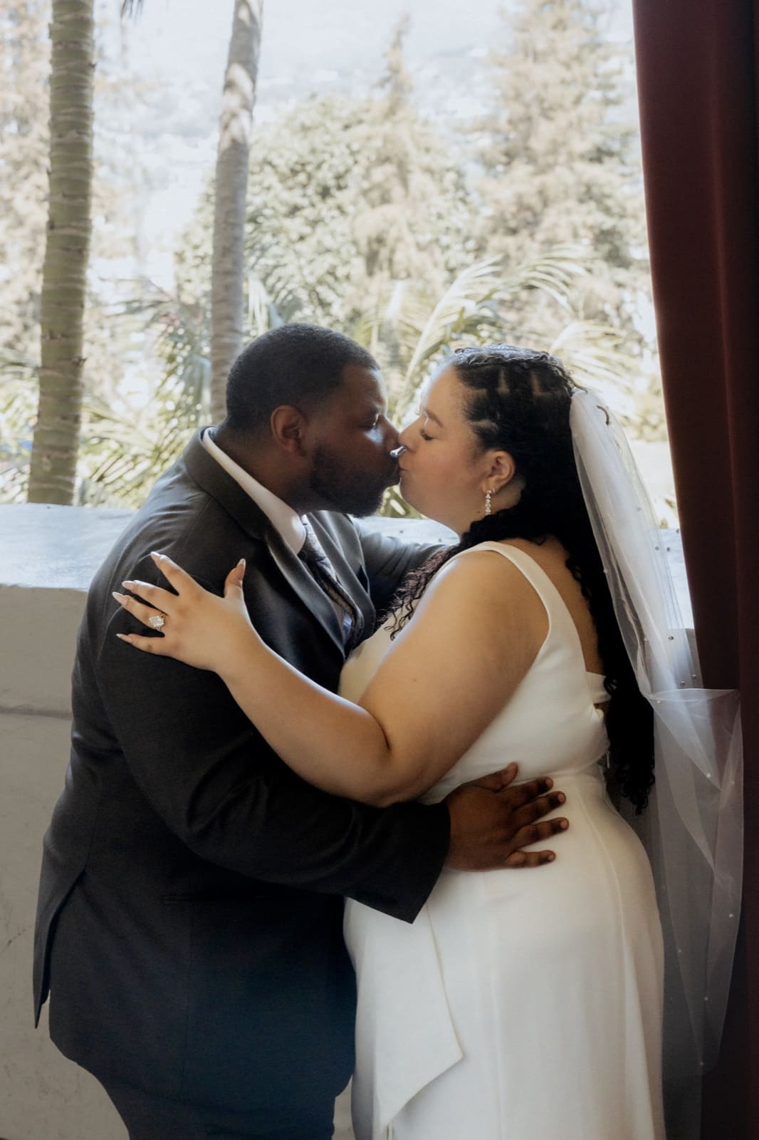 First kiss in the courthouse doorway