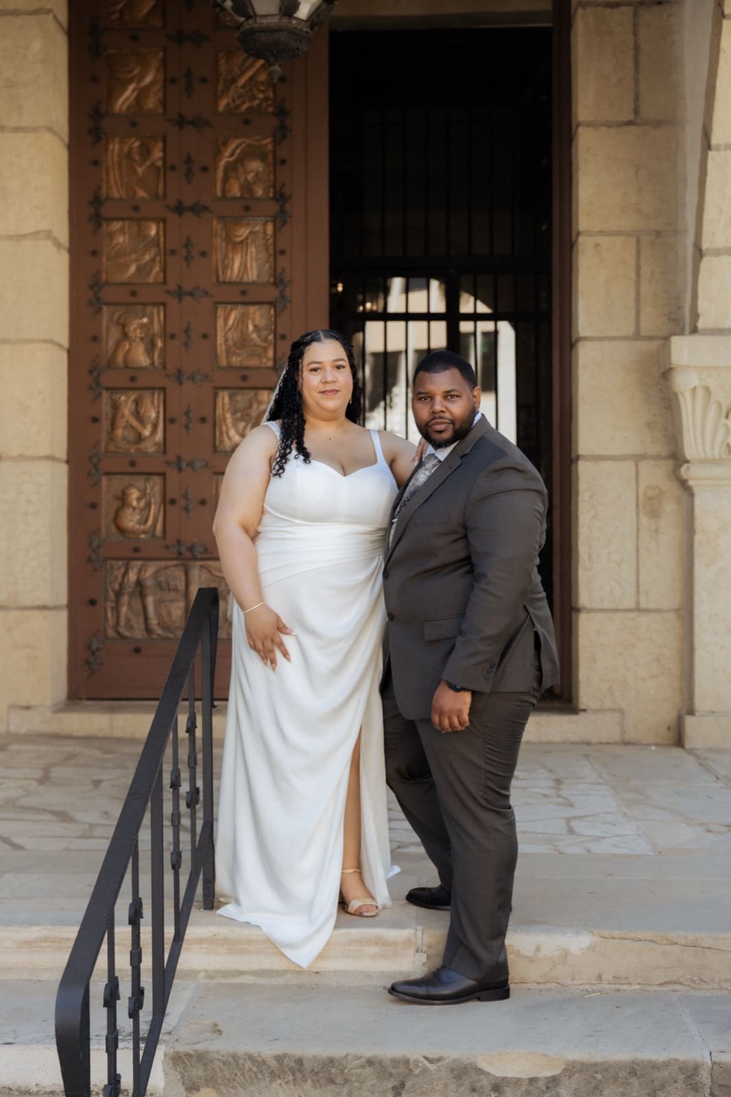 Portrait at the carved courthouse doors