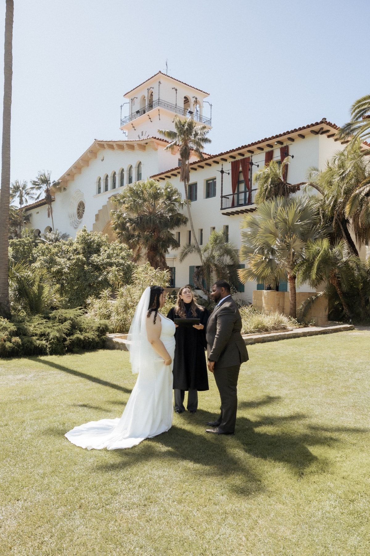 Couple embracing at golden hour during Southern California elopement photographed by Vida Visual