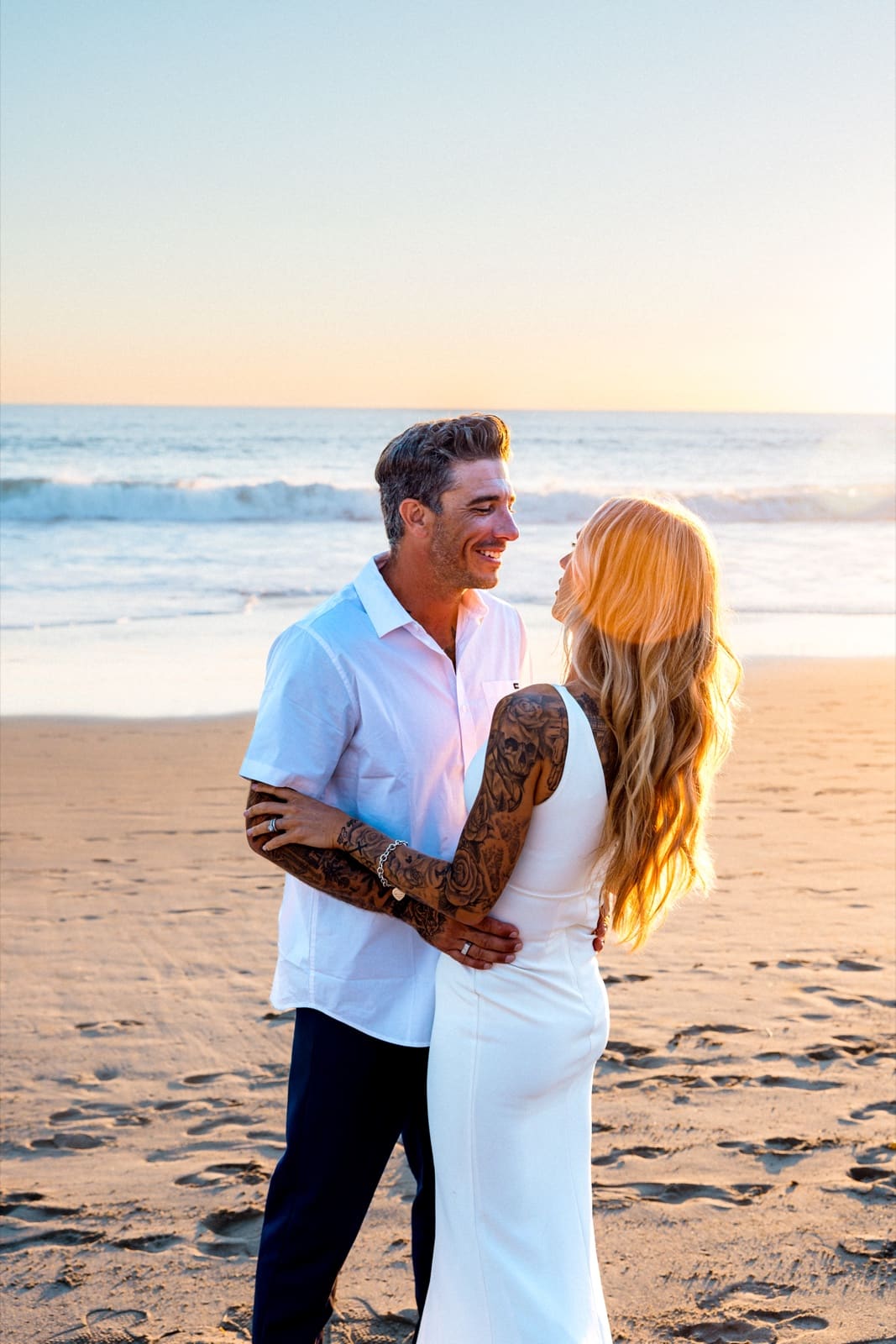 Couple forehead to forehead in the last light