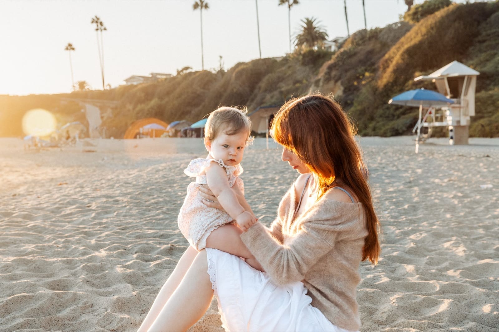 Mother and baby in the low sun at Laguna Beach