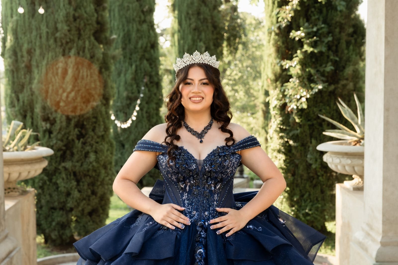 Quinceañera portrait in the cypress garden