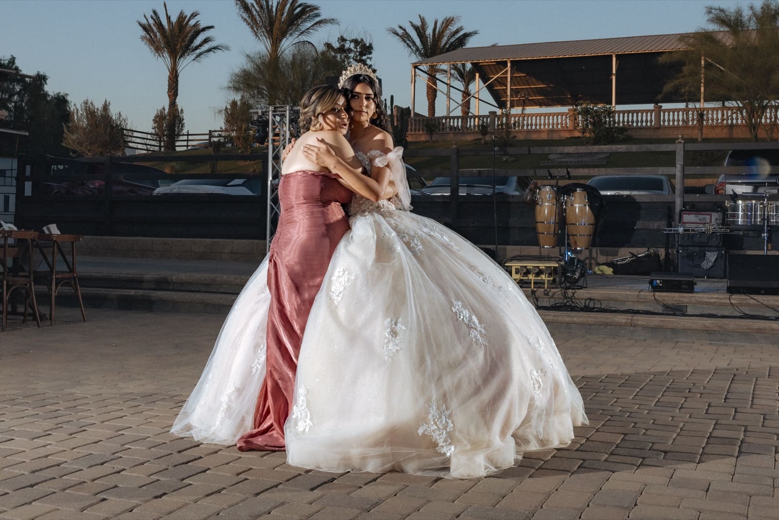 Quinceañera in a blush gown at the entrance to Rancho Quitasueños, Jurupa Valley