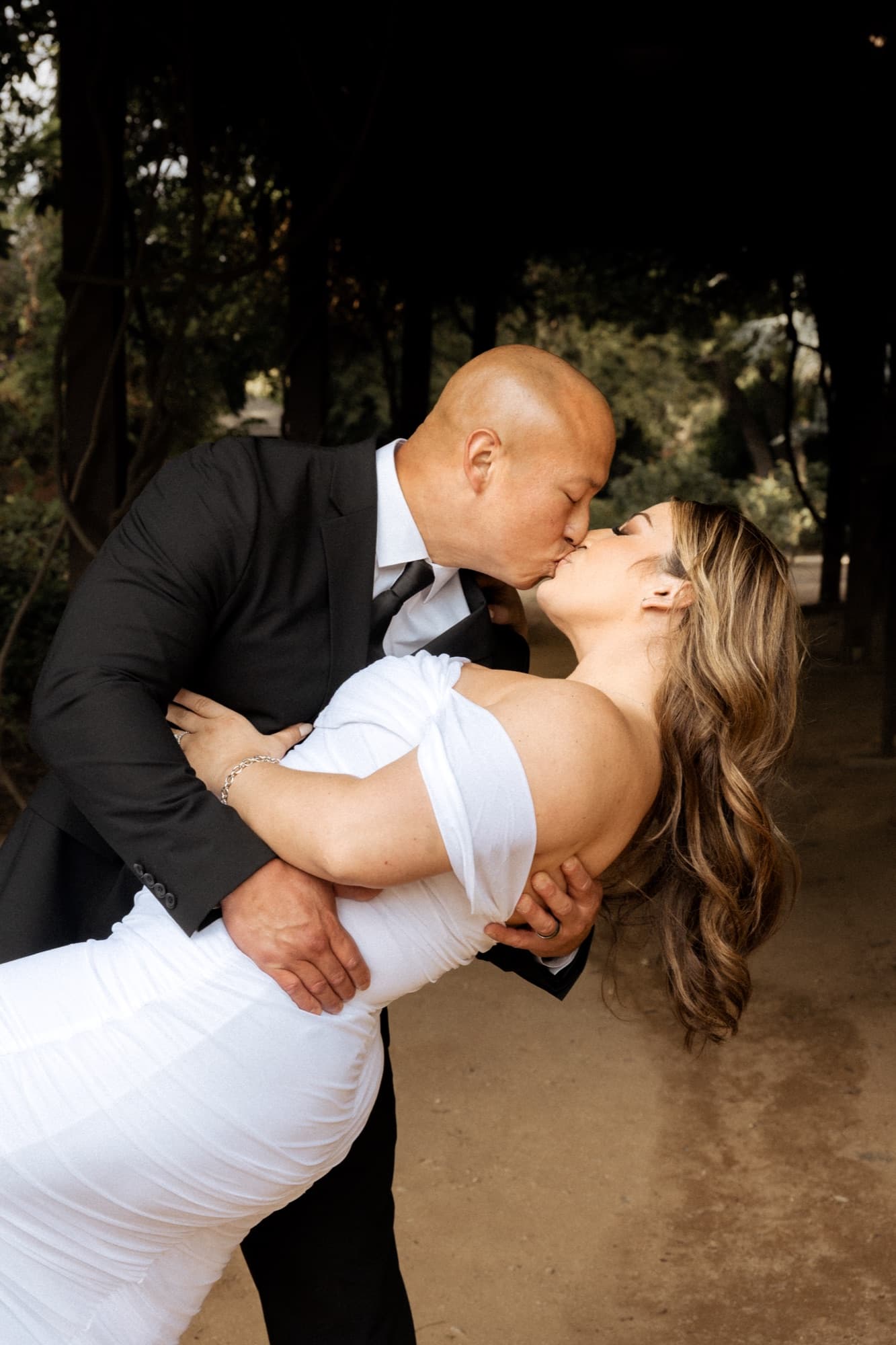 Elopement couple kissing after the vows